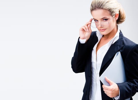 Portrait of clever business lady with glasses isolated on a white background