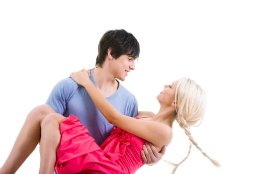 Image of beautiful blonde looking at handsome man while on his arms