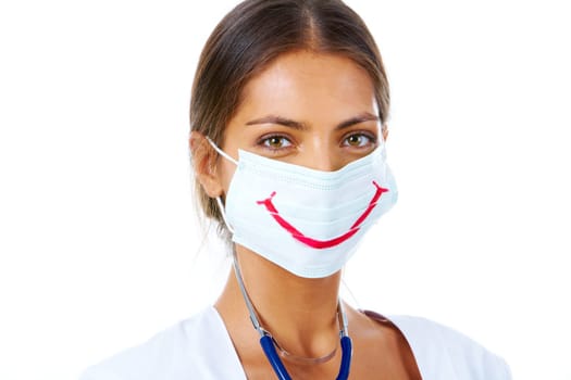 Portrait of assistant in mask with big smile on it looking at camera