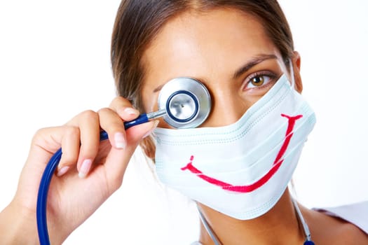 Portrait of assistant in mask with big smile on it looking at camera