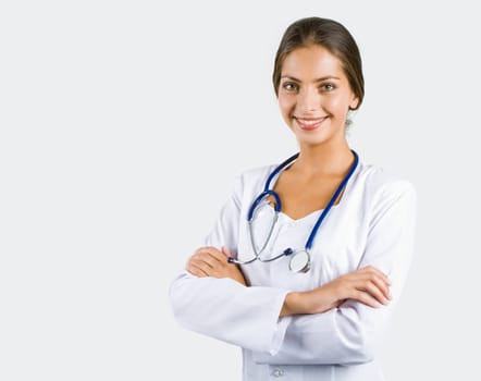 Portrait of happy therapeutist with her arms crossed looking at camera with smile