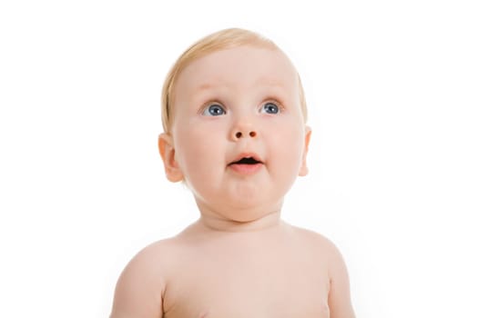 Portrait of cute little girl looking upwards with her mouth open
