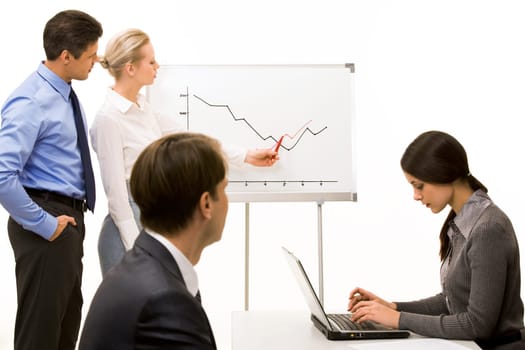 Image of business partners getting ready for report at working meeting