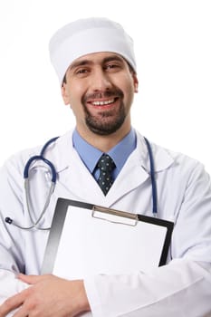 Portrait of smiling doctor with clipboard in hands looking at camera