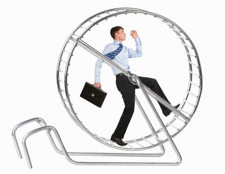 Photo of running man in metal wheel over white background