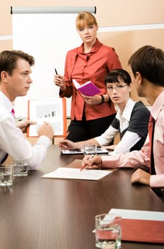 Image of several leaders discussing new working ideas at seminar