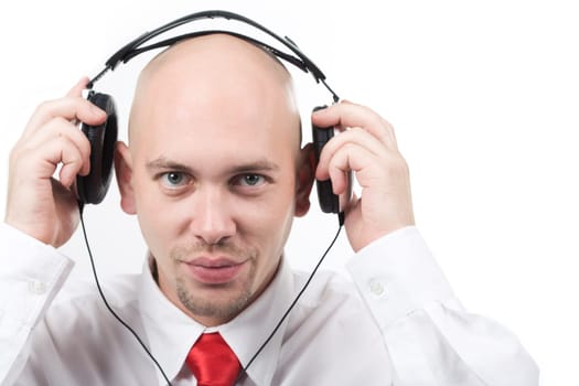 Portrait of handsome male preparing for listening to music through headphones