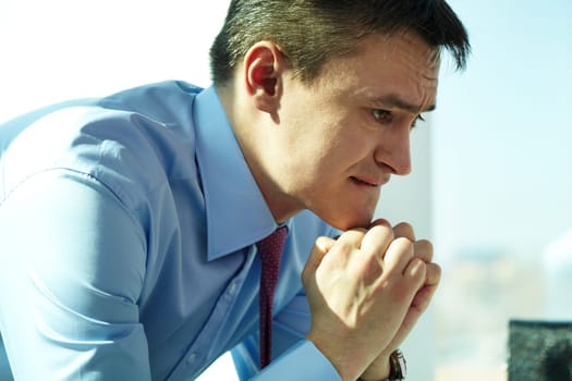 Image of serious man concentrating on thoughts