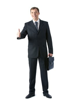 Vertical image of smart employer in suit looking at camera and showing thumb up