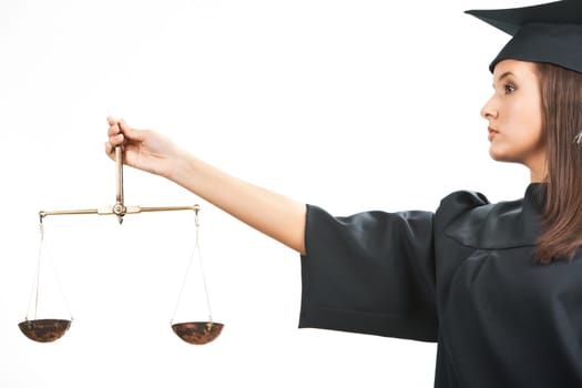 Young judge holding scales in isolation