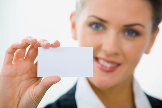 Image of  woman holding her visiting card