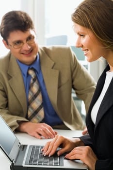 Successful business coach and his young beautiful female learner