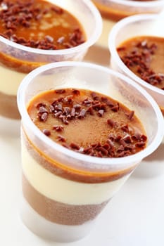 Three Tiramisu desserts in the cup