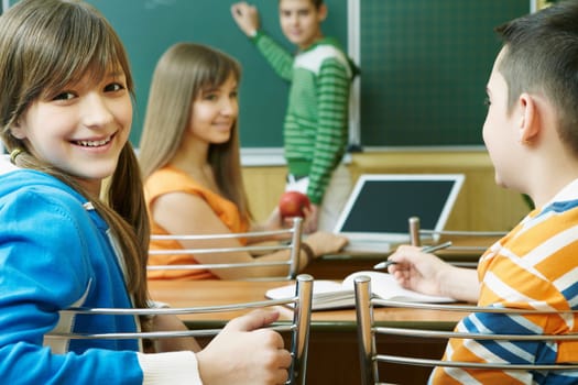 Confident student looking at camera during lesson