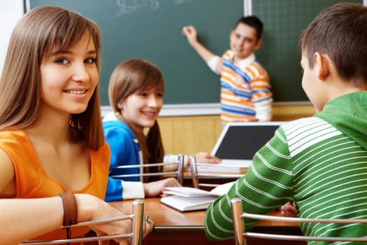Confident student looking at camera during lesson