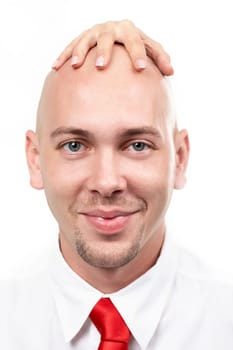 Portrait of bald man with female hand on his head