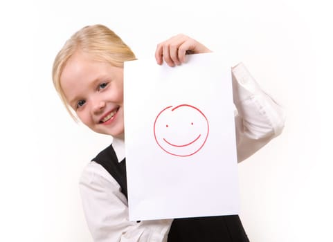 Portrait of pretty girl with drawing of happy face looking at camera