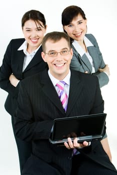 Vertical photo of business team with confident leader holding laptop at the front
