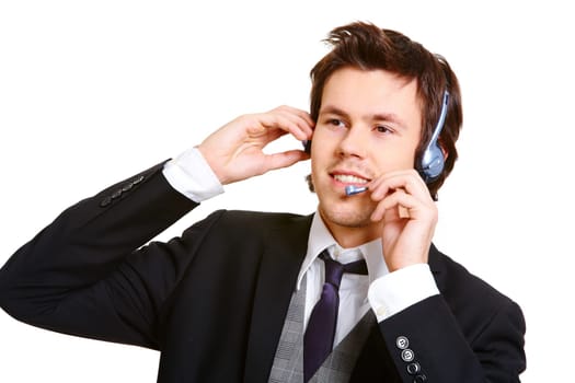 Young businessman in headset consulting client at work