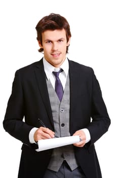 Confident businessman making notes and looking at camera on white background