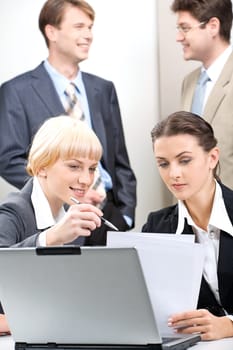 Business woman is giving a consultation to her colleague on the background of business people