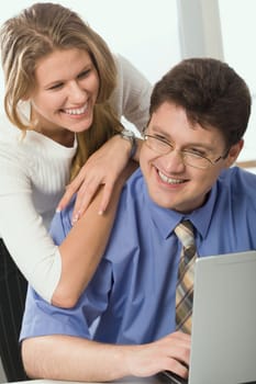 Business man and business woman are discussing an new ideas in the office