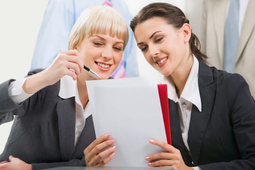 Business woman demonstrating a new plan to her colleague