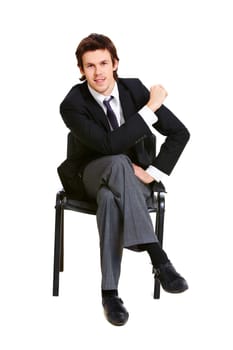 Image of successful businessman in elegant suit seated on chair