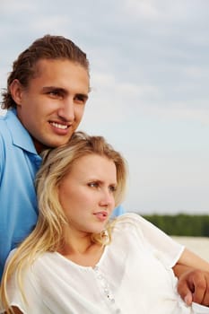 Photo of affectionate couple having rest during vacation