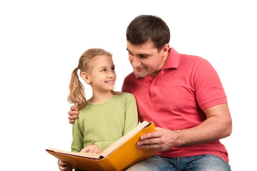 Portrait of loving father reading book together with his daughter