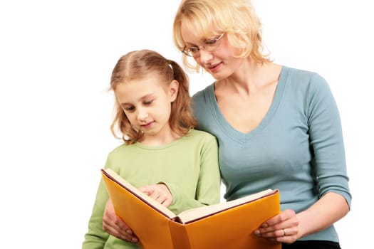 Portrait of loving mother reading book together with his daughter