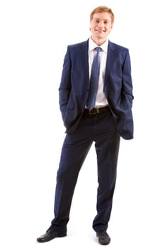 Vertical image of successful man standing in studio