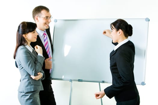 Portrait of business woman explaining her ideas on the whiteboard  at seminar