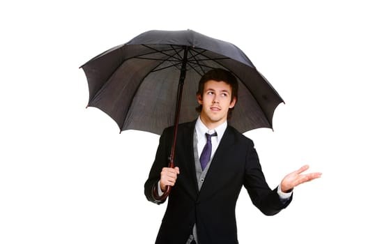 Image of elegant businessman under black umbrella