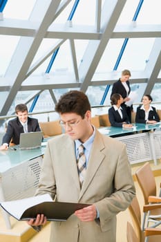 Portrait of  successful boss in a working environment