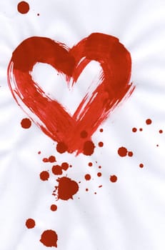 Illustration of red heart with splashing of paint around and inside it