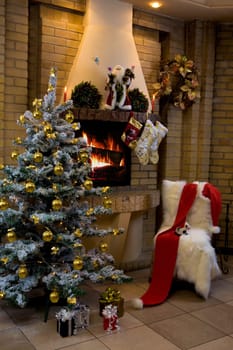 Image of empty room decorated for Christmas with fir tree, toys and decorations