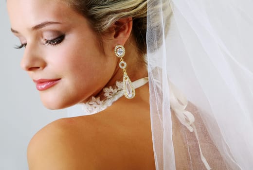 Portrait of pretty bride posing before camera