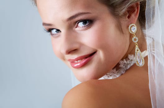 Portrait of pretty bride looking at camera