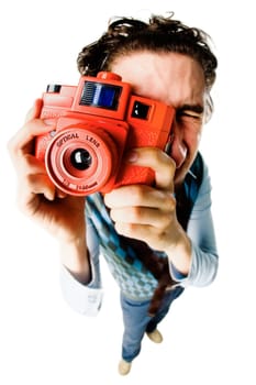 Fish-eye shot of a photographer making picture
