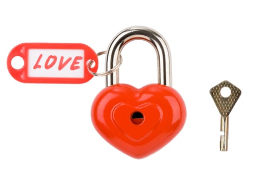 Image of metallic heart with love label and key