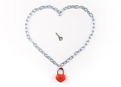 Photo of heart made of chain with lock and key