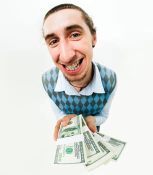 Shot of positive man with dollars in hands looking at camera with smile