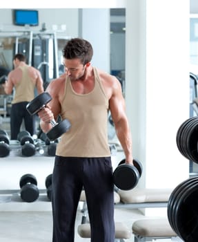 man with weight training equipment on sport gym club