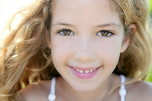 beautiful little girl portrait smiling closeup face looking camera