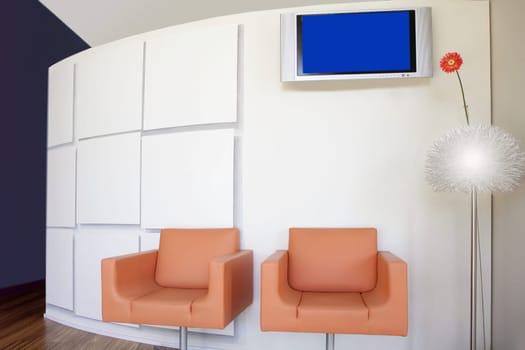 Nice modern interior design lobby, orange daisy gerbera flower