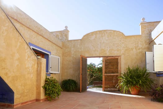 Spanish golden wall mediterranean style house, nice courtyard