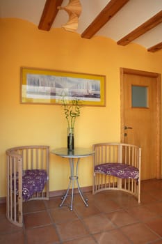 Lobbit, corridor in yellow color with wooden beams interior