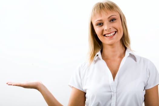 Portrait of young beautiful woman holding elegantly her hand on the white background