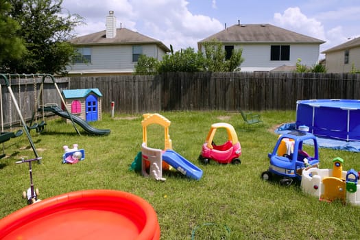 Children colorful playground at home over green grass